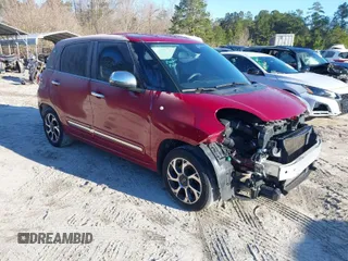 2014 FIAT 500L Lounge with VIN ZFBCFACH3EZ023149, listed as a IAAI auction lot 41596858 with 102,156 mi miles. Bid and sale history available at carsss.com. Image 1.