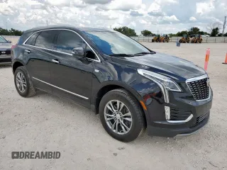 2021 Cadillac XT5 FWD Premium Luxury with VIN 1GYKNCRS0MZ100515, listed as a Copart auction lot 62856785 with 50,298 mi miles and Salvage title. Bid and sale history available at DreamBid. Image 4.