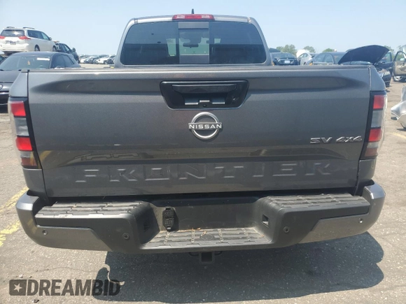 2024 Nissan Frontier SV with VIN 1N6ED1FKXRN605620, listed as a Copart auction lot 59854695 with 8,828 mi miles and Salvage title. Bid and sale history available at DreamBid. Image 6.