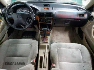 1993 Honda Accord z VIN 1HGCB7652PA155769, wystawiony jako Copart lot #45200625 z przebiegiem 251 834 mil mil oraz Szkoda całkowita • Salvage title. Historia ofert i sprzedaży dostępna na DreamBid. Obrazek 8.
