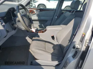 2001 Mercedes-Benz E-Class with VIN WDBJF65J11B272438, listed as a Copart auction lot 69214744 with 194,492 mi miles and Salvage Title. Bid and sale history available at carsss.com. Image 7.