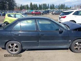 2006 Nissan Sentra SE-R Spec V z VIN 3N1AB51D46L495721, wystawiony jako IAAI lot #41886006 z przebiegiem 201 712 mil mil oraz . Historia ofert i sprzedaży dostępna na DreamBid. Obrazek 13.