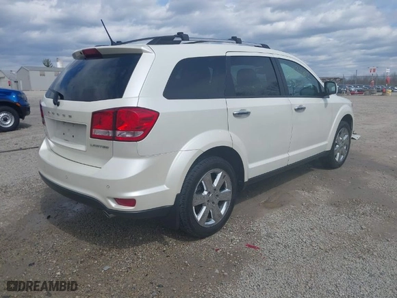 2014 Dodge Journey Limited with VIN 3C4PDCDG8ET142487, listed as a IAAI auction lot 41883362 with 117,632 mi miles. Bid and sale history available at carsss.com. Image 4.