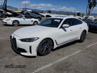 2023 BMW i4 eDrive40 with VIN WBY73AW05PFN75140, listed as a Copart auction lot 51791515 with 28,426 mi miles and Salvage Title. Bid and sale history available at carsss.com. Image 1.