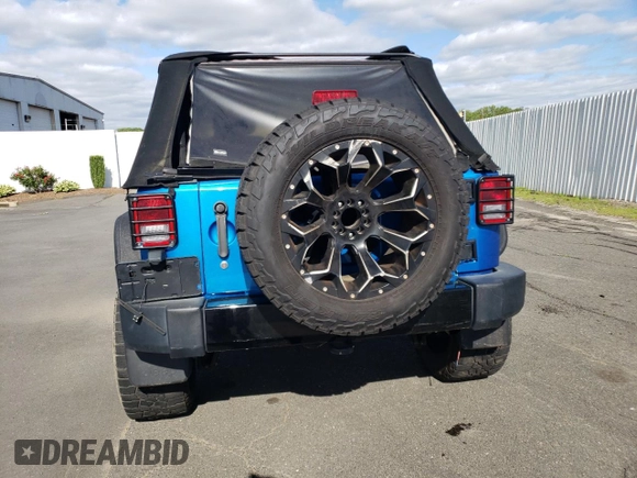 2016 Jeep Wrangler Unlimited Sport z VIN 1C4BJWDG3GL115622, wystawiony jako Copart lot #57872455 z przebiegiem 98 812 mil mil oraz Szkoda całkowita • Salvage title. Historia ofert i sprzedaży dostępna na DreamBid. Obrazek 6.