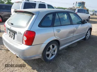 2003 Mazda Protege with VIN JM1BJ245031218333, listed as a IAAI auction lot 42070471 with 181,748 mi miles and . Bid and sale history available at DreamBid. Image 4.