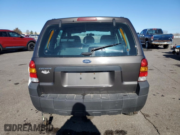 2007 Ford Escape XLS z VIN 1FMYU02Z77KA52643, wystawiony jako Copart lot #50971365 z przebiegiem 183 604 mil mil oraz Szkoda całkowita • Salvage title. Historia ofert i sprzedaży dostępna na DreamBid. Obrazek 6.
