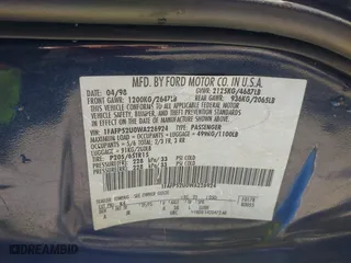 1998 Ford Taurus LX with VIN 1FAFP52U0WA226924, listed as a IAAI auction lot 41702083 with 55,998 mi miles. Bid and sale history available at carsss.com. Image 9.