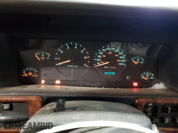 1997 Jeep Grand Cherokee Limited with VIN 1J4GZ78Y4VC589688, listed as a Copart auction lot 84673974 with 183,930 mi miles and Salvage Title. Bid and sale history available at carsss.com. Image 9.