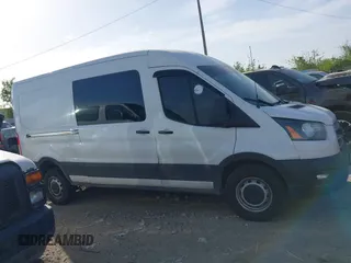 2020 Ford Transit Cargo with VIN 1FTBR1C81LKB10957, listed as a IAAI auction lot 41830210 with 86,006 mi miles and . Bid and sale history available at DreamBid. Image 13.