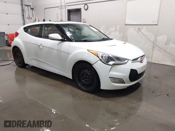2012 Hyundai Veloster w/Black Int with VIN KMHTC6AD2CU064171, listed as a IAAI auction lot 41841873 with 192,670 mi miles and . Bid and sale history available at DreamBid. Image 1.