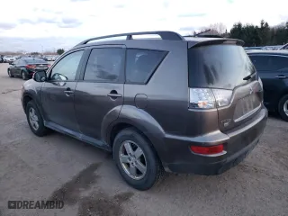 2011 Mitsubishi Outlander LS with VIN JA4JT3AXXBU610616, listed as a Copart auction lot 82882744 with 309,979 mi miles and Clean Title. Bid and sale history available at carsss.com. Image 2.