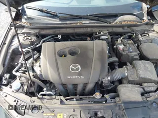 2021 Mazda 3 Premium z VIN 3MZBPADL2MM254467, wystawiony jako IAAI lot #42151557 z przebiegiem 63 282 mil mil oraz . Historia ofert i sprzedaży dostępna na DreamBid. Obrazek 10.