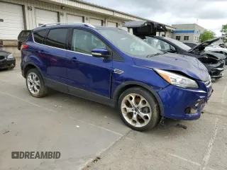 2015 Ford Escape Titanium with VIN 1FMCU9J99FUC22925, listed as a Copart auction lot 56871275 with 113,452 mi miles and Non Repairable. Bid and sale history available at DreamBid. Image 4.