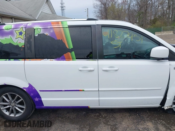 2014 Dodge Grand Caravan SXT with VIN 2C4RDGCG6ER361842, listed as a IAAI auction lot 41827951 with 100,845 mi miles and . Bid and sale history available at DreamBid. Image 13.