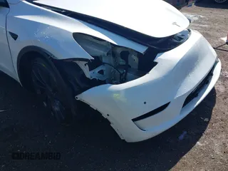 2021 Tesla Model Y Performance z VIN 5YJYGDEF0MF076263, wystawiony jako IAAI lot #42134022 z przebiegiem Nie podano mil oraz . Historia ofert i sprzedaży dostępna na DreamBid. Obrazek 6.