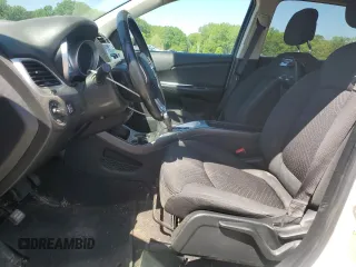 2018 Dodge Journey SE with VIN 3C4PDCAB6JT385668, listed as a Copart auction lot 53448745 with 106,446 mi miles and Salvage Title. Bid and sale history available at DreamBid. Image 7.