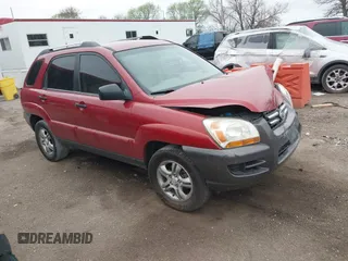2005 Kia Sportage LX z VIN KNDJF723457096183, wystawiony jako IAAI lot #42072836 z przebiegiem 182 544 mil mil oraz . Historia ofert i sprzedaży dostępna na DreamBid. Obrazek 1.