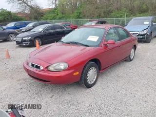 1999 Mercury Sable GS with VIN 1MEFM50U4XG622650, listed as a IAAI auction lot 42099721 with 86,899 mi miles. Bid and sale history available at carsss.com. Image 2.