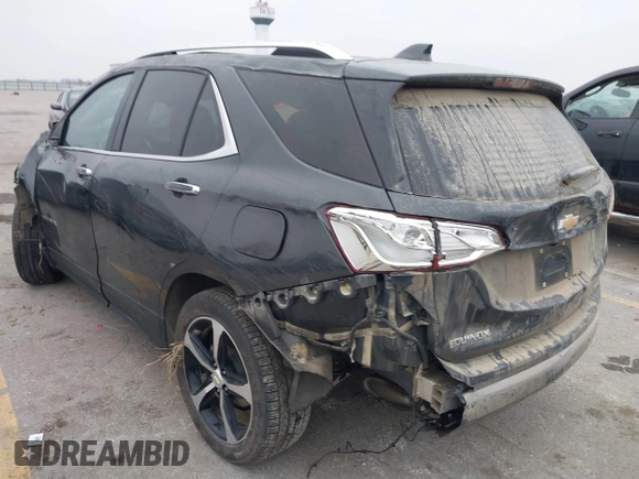 2021 Chevrolet Equinox Premier z VIN 2GNAXXEV2M6118116, wystawiony jako IAAI lot #41185151 z przebiegiem 91 837 mil mil oraz . Historia ofert i sprzedaży dostępna na DreamBid. Obrazek 3.
