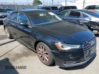 2016 Audi A6 Premium with VIN WAUCFAFC7GN162981, listed as a IAAI auction lot 42660005 with 148,038 mi miles and . Bid and sale history available at DreamBid. Image 1.