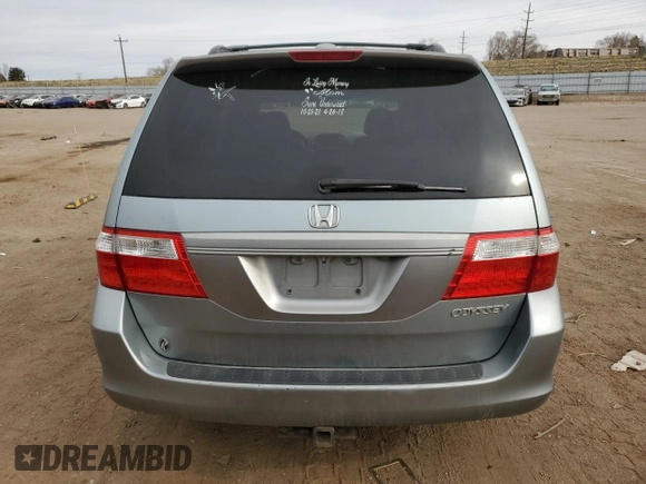 2005 Honda Odyssey EX-L with VIN 5FNRL38715B116530, listed as a Copart auction lot 50807575 with 216,434 mi miles and Salvage Title. Bid and sale history available at DreamBid. Image 6.