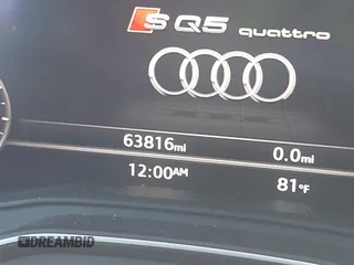 2018 Audi SQ5 Premium Plus z VIN WA1A4AFY0J2236191, wystawiony jako IAAI lot #39742989 z przebiegiem 63 816 mil mil oraz . Historia ofert i sprzedaży dostępna na DreamBid. Obrazek 7.