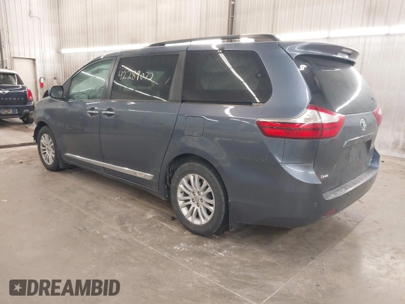 2016 Toyota Sienna XLE with VIN 5TDYK3DC3GS747411, listed as a IAAI auction lot 42289072 with 184,546 mi miles and . Bid and sale history available at DreamBid. Image 3.