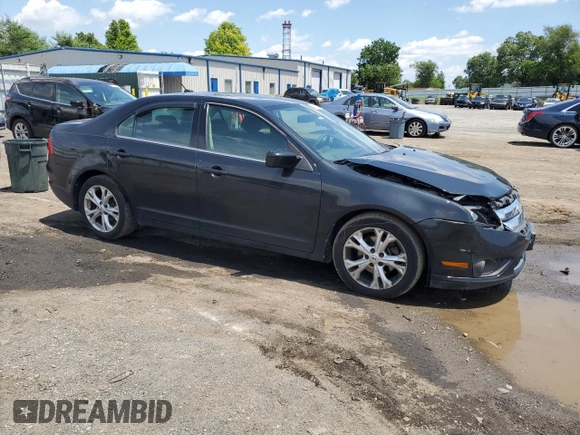 2012 Ford Fusion SE z VIN 3FAHP0HA7CR306411, wystawiony jako Copart lot #60476635 z przebiegiem 173 779 mil mil oraz Szkoda całkowita • Salvage title. Historia ofert i sprzedaży dostępna na DreamBid. Obrazek 4.
