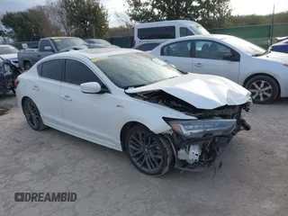 2020 Acura ILX w/Premium/A-SPEC Pkg with VIN 19UDE2F89LA004463, listed as a IAAI auction lot 41371656 with 104,463 mi miles. Bid and sale history available at carsss.com. Image 1.