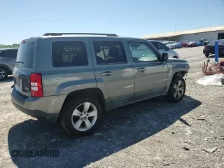 2011 Jeep Patriot Latitude z VIN 1J4NF1GB2BD229920, wystawiony jako Copart lot #57548445 z przebiegiem 188 712 mil mil oraz Szkoda całkowita • Salvage title. Historia ofert i sprzedaży dostępna na DreamBid. Obrazek 14.