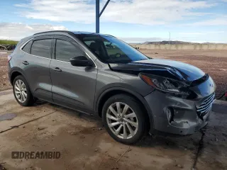 2021 Ford Escape Titanium with VIN 1FMCU9J92MUA08792, listed as a Copart auction lot 59270215 with 29,194 mi miles and Salvage title. Bid and sale history available at DreamBid. Image 4.