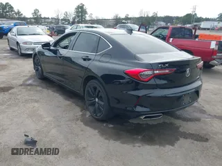 2021 Acura TLX w/Technology Package with VIN 19UUB6F48MA004162, listed as a IAAI auction lot 41815089 with 48,692 mi miles. Bid and sale history available at carsss.com. Image 3.