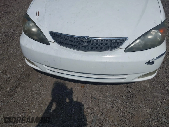 2003 Toyota Camry LE with VIN JTDBE32K830222476, listed as a IAAI auction lot 42160720 with 161,570 mi miles and . Bid and sale history available at DreamBid. Image 12.