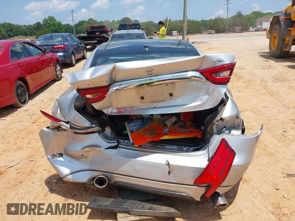2016 Nissan Maxima SR with VIN 1N4AA6AP7GC389606, listed as a IAAI auction lot 42451614 with 114,957 mi miles and . Bid and sale history available at DreamBid. Image 16.