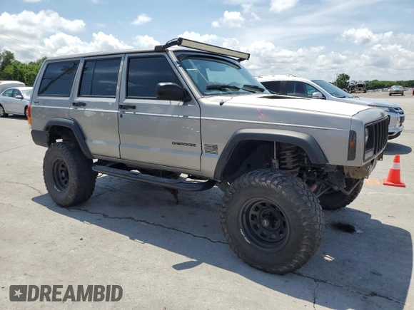 2000 Jeep Cherokee SE with VIN 1J4FF28SXYL140930, listed as a Copart auction lot 59191035 with 248,598 mi miles and Salvage title. Bid and sale history available at DreamBid. Image 4.