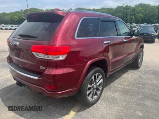 2018 Jeep Grand Cherokee Overland with VIN 1C4RJFCG2JC274512, listed as a Copart auction lot 63438715 with 161,870 mi miles and Clean title. Bid and sale history available at DreamBid. Image 4.
