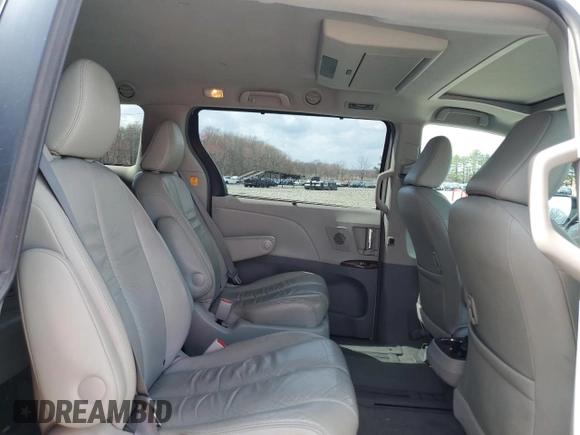 2011 Toyota Sienna XLE with VIN 5TDDK3DC1BS010411, listed as a Copart auction lot 51213065 with 174,214 mi miles and Salvage title. Bid and sale history available at DreamBid. Image 12.