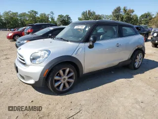 2015 MINI Paceman z VIN WMWSS1C56FWN94886, wystawiony jako Copart lot #70387184 z przebiegiem 98 574 mil mil oraz Szkoda całkowita • Salvage title. Historia ofert i sprzedaży dostępna na DreamBid. Obrazek 1.