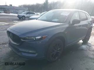 2021 Mazda CX-5 Touring z VIN JM3KFBCMXM0463469, wystawiony jako IAAI lot #41488993 z przebiegiem 28 582 mil mil oraz . Historia ofert i sprzedaży dostępna na DreamBid. Obrazek 17.