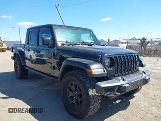 2022 Jeep Gladiator Texas Trail with VIN 1C6HJTAG2NL120506, listed as a IAAI auction lot 42048215 with 65,048 mi miles. Bid and sale history available at carsss.com. Image 1.