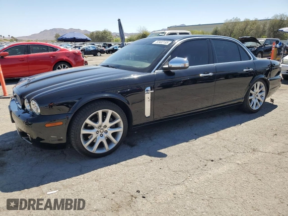 2009 Jaguar XJ 8 with VIN SAJWA71B79SH30431, listed as a Copart auction lot 52403185 with 67,143 mi miles and Salvage Title. Bid and sale history available at DreamBid. Image 1.
