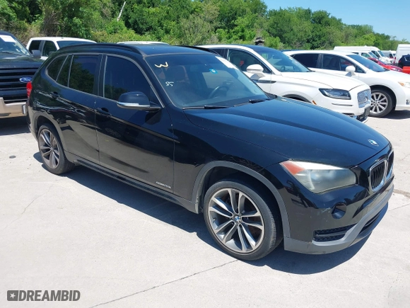 2014 BMW X1 sDrive28i with VIN WBAVM1C5XEVW51666, listed as a IAAI auction lot 42083936 with 176,465 mi miles. Bid and sale history available at carsss.com. Image 1.