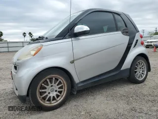 2011 Smart fortwo Pure with VIN WMEEJ3BA5BK438144, listed as a Copart auction lot 51934465 with 135,584 mi miles and Salvage title. Bid and sale history available at DreamBid. Image 1.