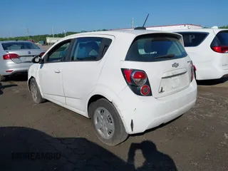 2015 Chevrolet Sonic LS with VIN 1G1JA6SG8F4131976, listed as a IAAI auction lot 42552157 with 99,575 mi miles and . Bid and sale history available at DreamBid. Image 3.