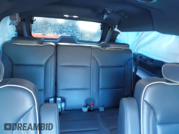 2023 Chevrolet Suburban Premier with VIN 1GNSKFKD3PR263697, listed as a IAAI auction lot 41903910 with 31,574 mi miles and . Bid and sale history available at DreamBid. Image 18.