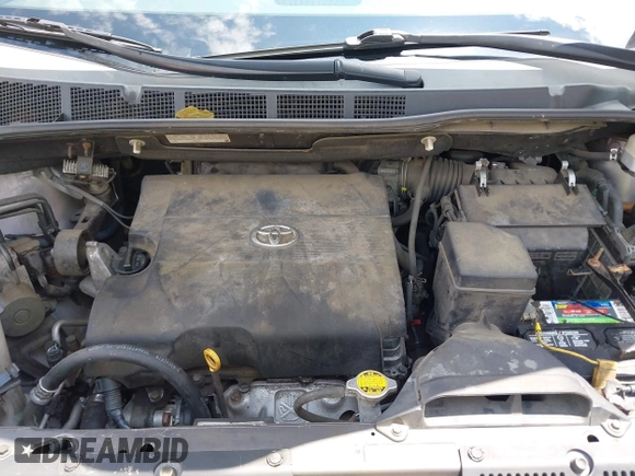 2012 Toyota Sienna SE with VIN 5TDXK3DC2CS235211, listed as a IAAI auction lot 42390354 with 242,602 mi miles and . Bid and sale history available at DreamBid. Image 10.