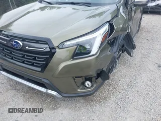 2023 Subaru Forester Touring with VIN JF2SKARC6PH400678, listed as a IAAI auction lot 42694547 with 14,484 mi miles and . Bid and sale history available at DreamBid. Image 18.