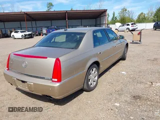 2006 Cadillac DTS w/1SC with VIN 1G6KD57Y86U209092, listed as a IAAI auction lot 41811298 with 156,676 mi miles. Bid and sale history available at carsss.com. Image 4.