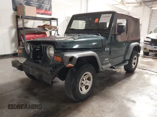 2003 Jeep Wrangler X z VIN 1J4FA39S43P339234, wystawiony jako IAAI lot #41329654 z przebiegiem 175 376 mil mil oraz . Historia ofert i sprzedaży dostępna na DreamBid. Obrazek 18.